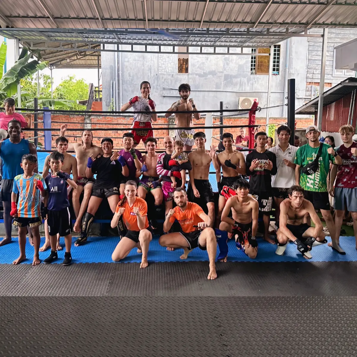 Interclub open sparring participants gathered at The Temple Kun Khmer in Siem Reap.