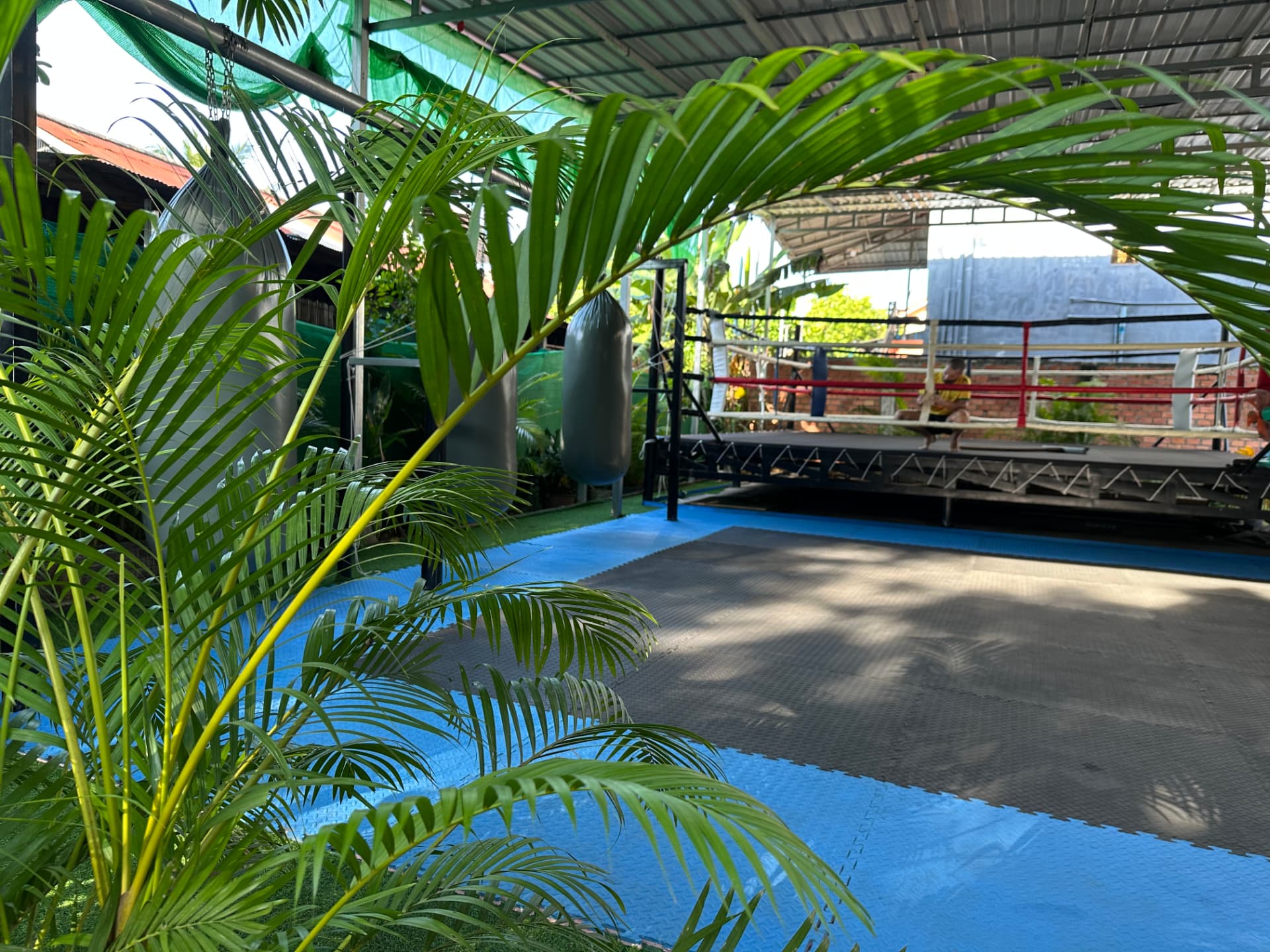 Open-air training floor and boxing ring at The Temple Kun Khmer Siem Reap